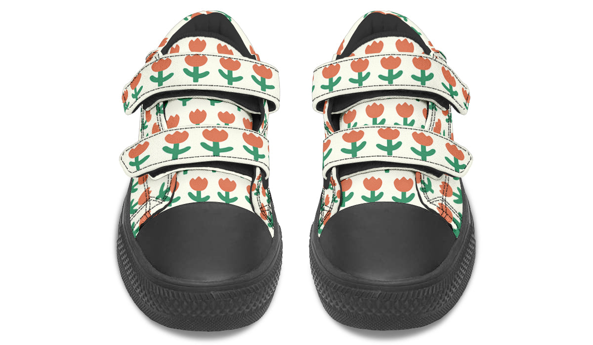 Kids low top shoes featuring a vibrant floral pattern, made from durable canvas with a rubber outsole.