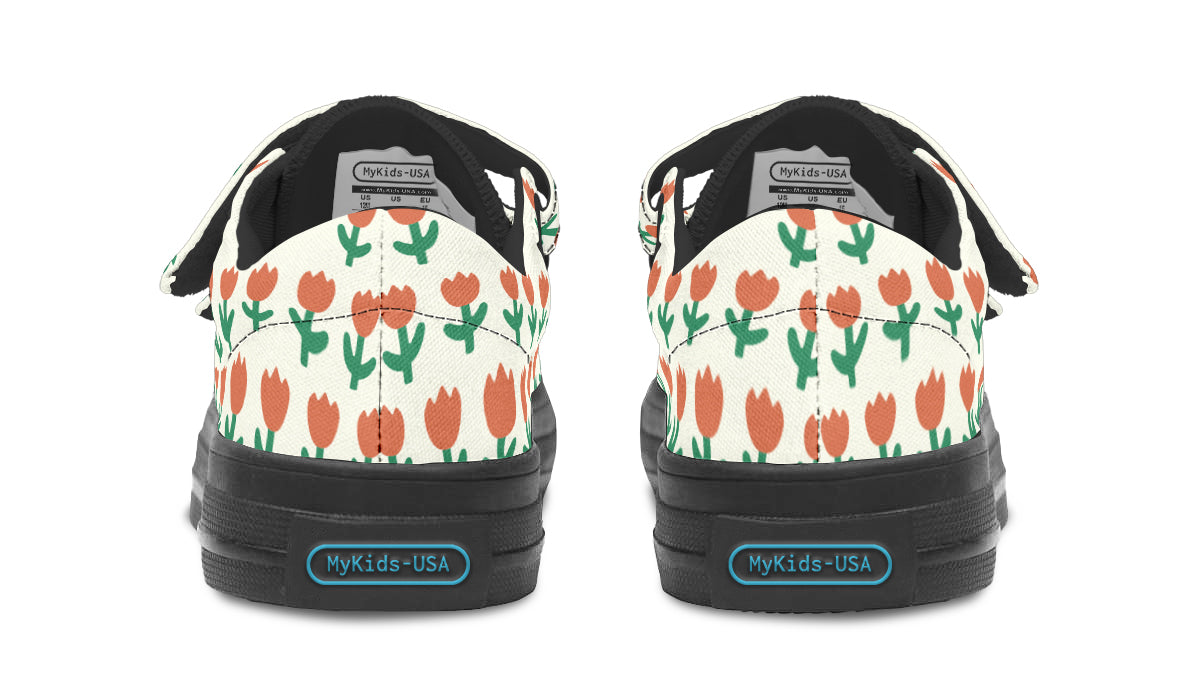 Kids low top shoes featuring a vibrant floral pattern, made from durable canvas with a rubber outsole.