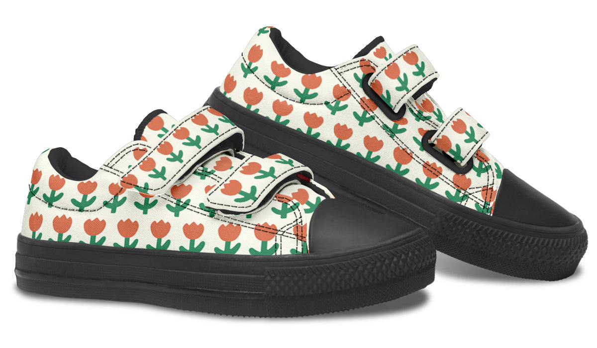 Kids low top shoes featuring a vibrant floral pattern, made from durable canvas with a rubber outsole.
