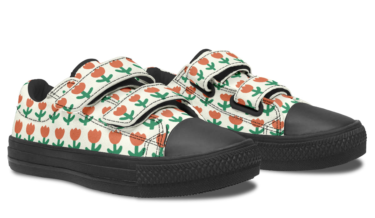 Kids low top shoes featuring a vibrant floral pattern, made from durable canvas with a rubber outsole.