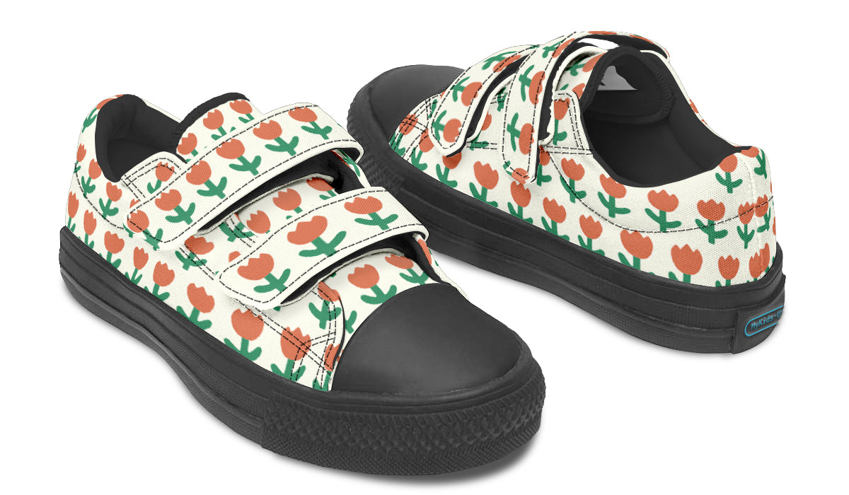 Kids low top shoes featuring a vibrant floral pattern, made from durable canvas with a rubber outsole.