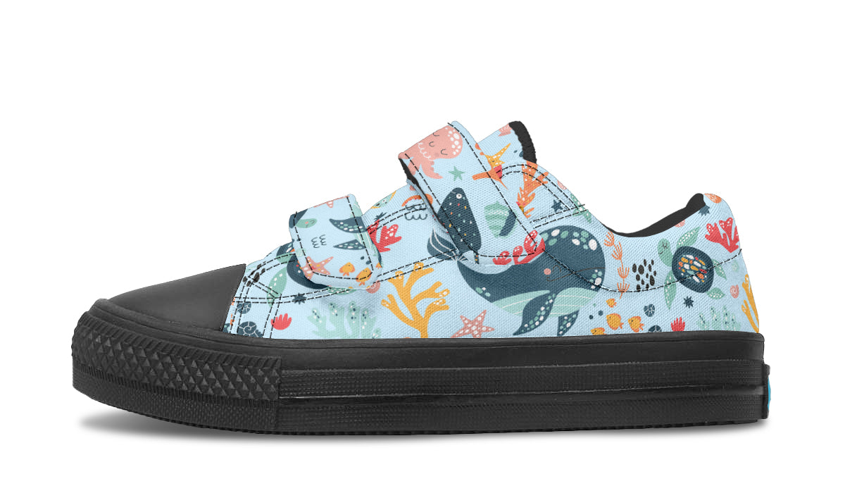 Colorful kids low top shoes featuring various sea animals, perfect for playful adventures.