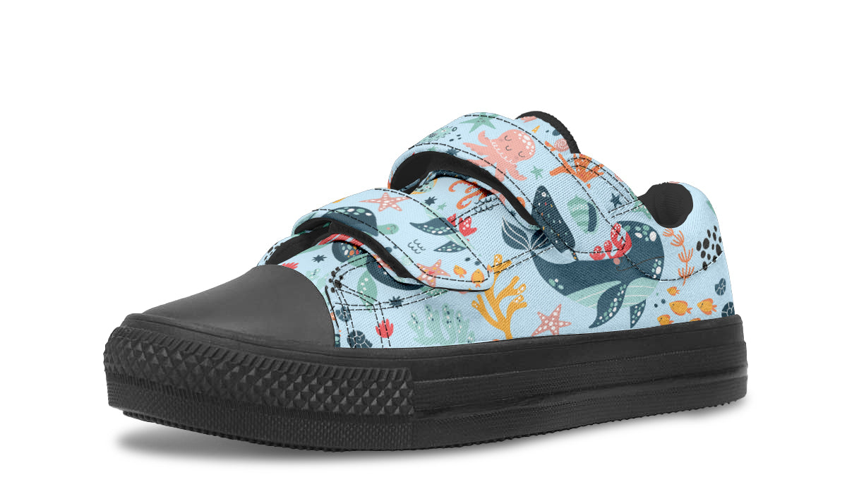 Colorful kids low top shoes featuring various sea animals, perfect for playful adventures.