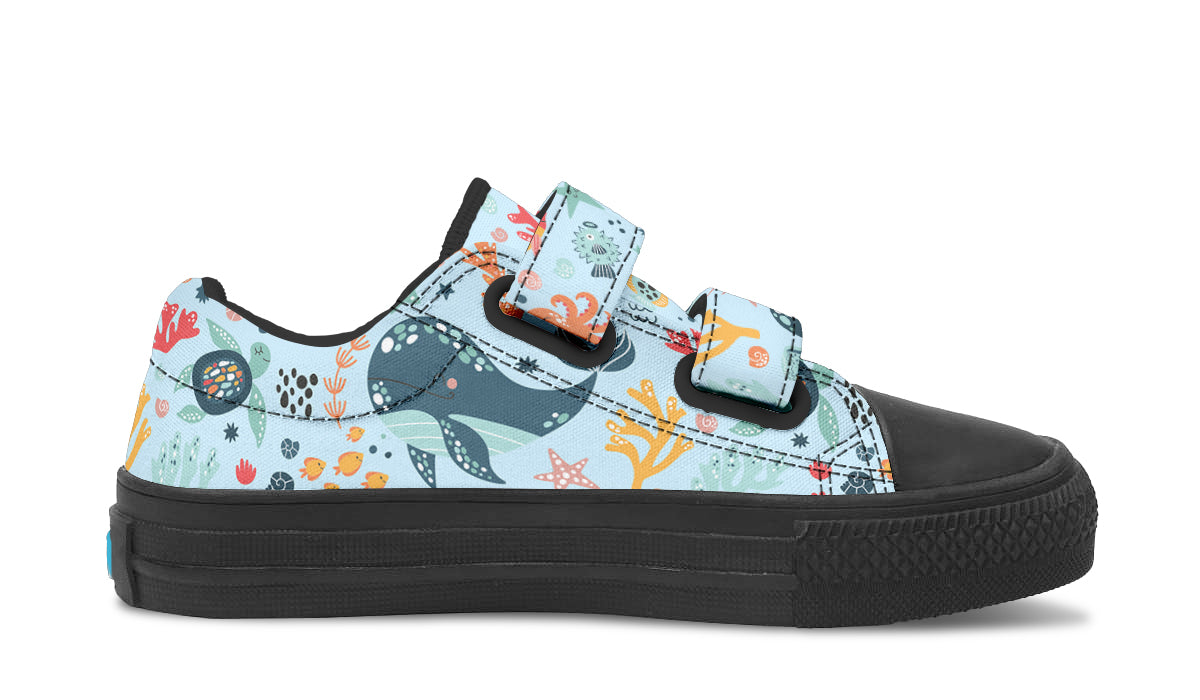 Colorful kids low top shoes featuring various sea animals, perfect for playful adventures.
