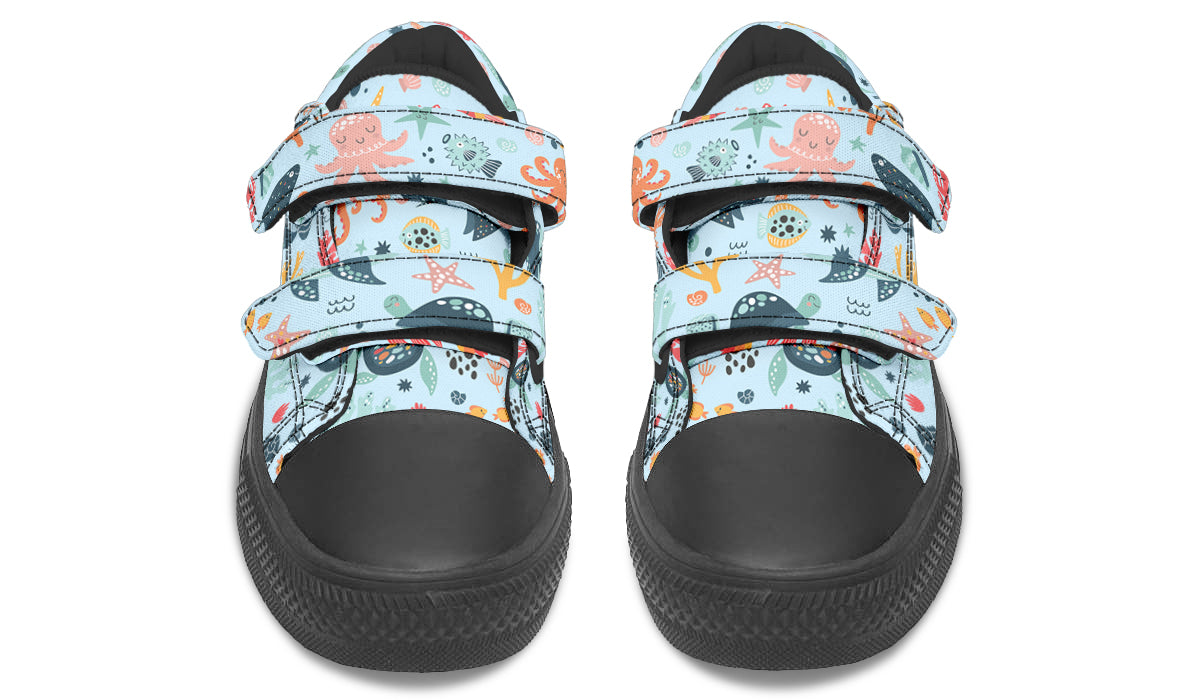 Colorful kids low top shoes featuring various sea animals, perfect for playful adventures.