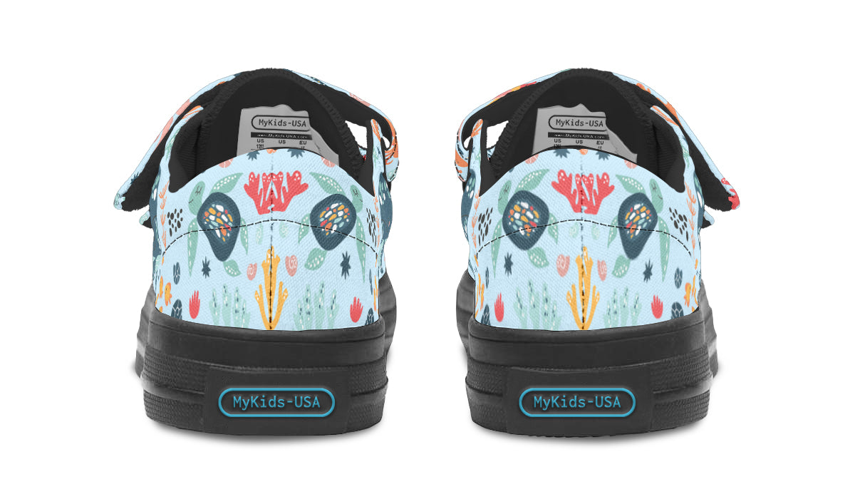 Colorful kids low top shoes featuring various sea animals, perfect for playful adventures.