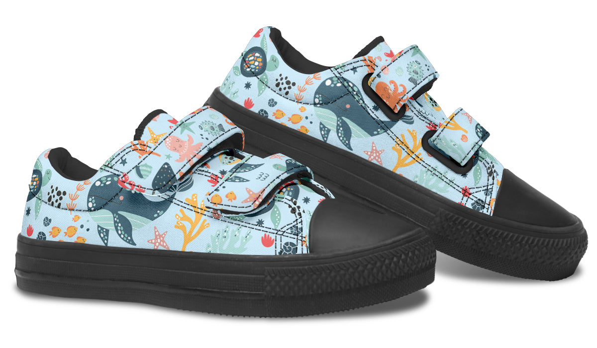 Colorful kids low top shoes featuring various sea animals, perfect for playful adventures.