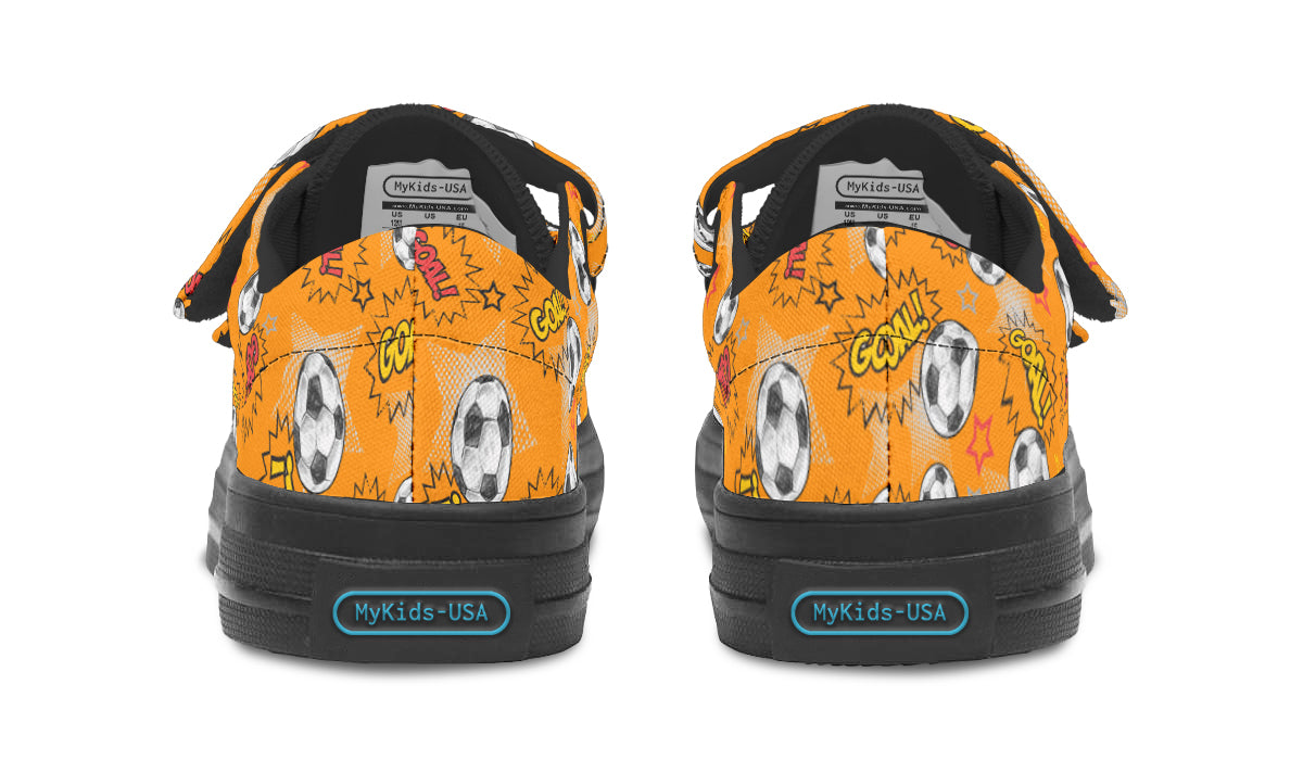 Colorful kids low top soccer shoes with rubber outsole and canvas fabric, perfect for young athletes.