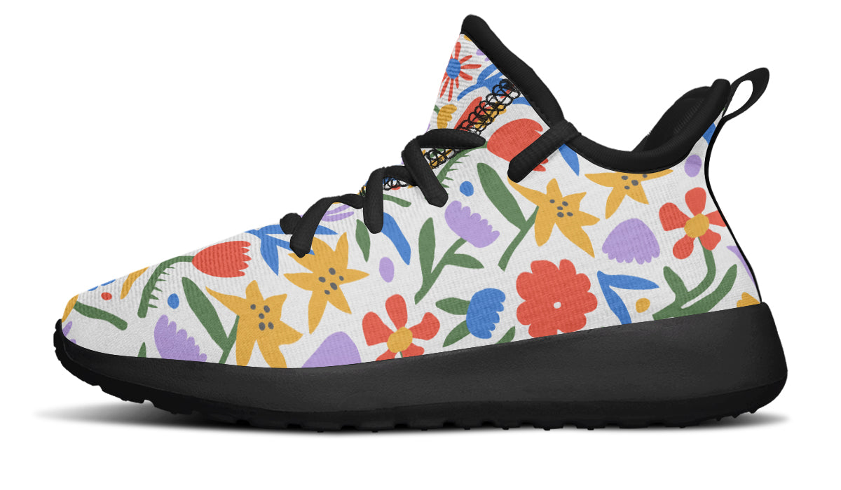 Colorful kids sneakers featuring an abstract flower design, lightweight mesh, and a comfortable fit.