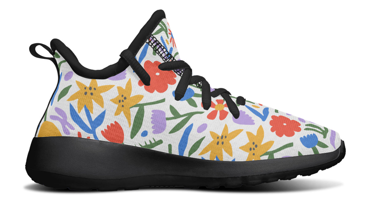 Colorful kids sneakers featuring an abstract flower design, lightweight mesh, and a comfortable fit.