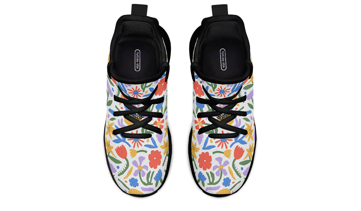 Colorful kids sneakers featuring an abstract flower design, lightweight mesh, and a comfortable fit.