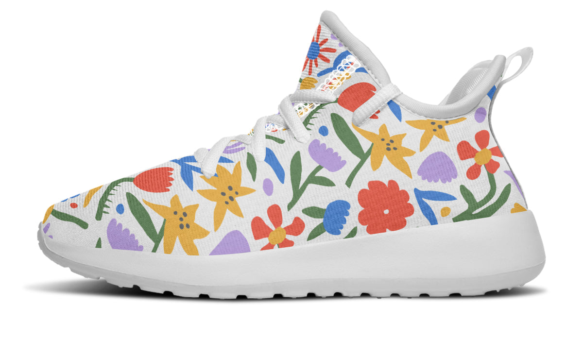 Colorful kids sneakers featuring an abstract flower design, lightweight mesh, and a comfortable fit.