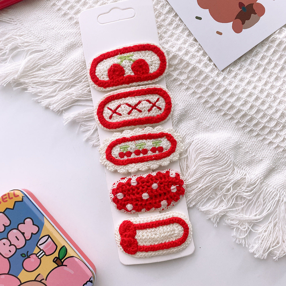 Korean-style versatile knit hair clip featuring a sweet floral design in vibrant colors, suitable for baby girls and girls aged 0-12 years.