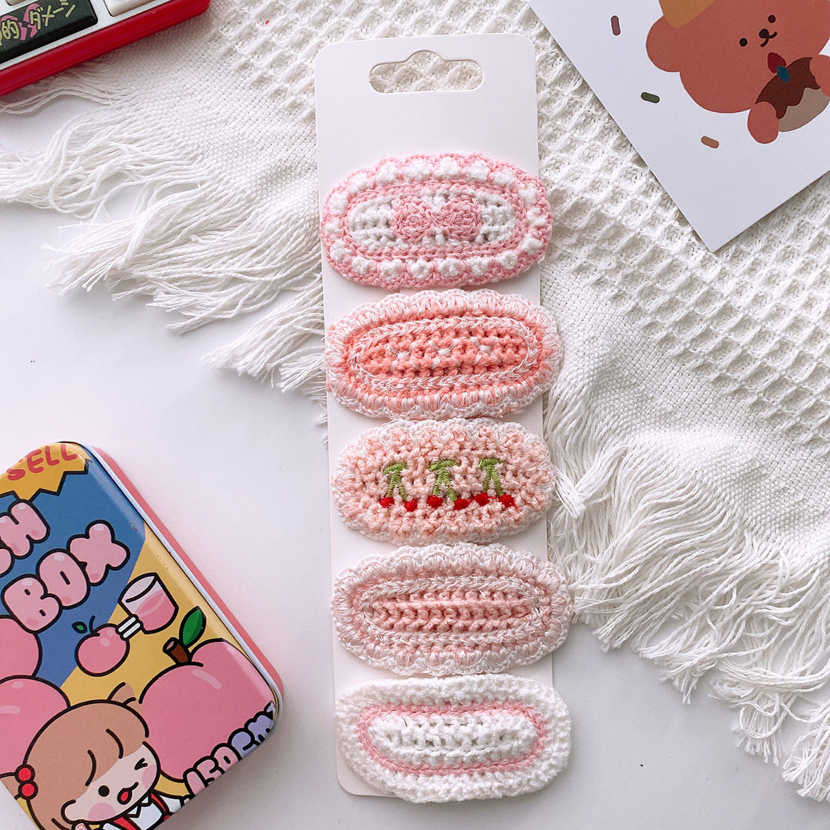Korean-style versatile knit hair clip featuring a sweet floral design in vibrant colors, suitable for baby girls and girls aged 0-12 years.