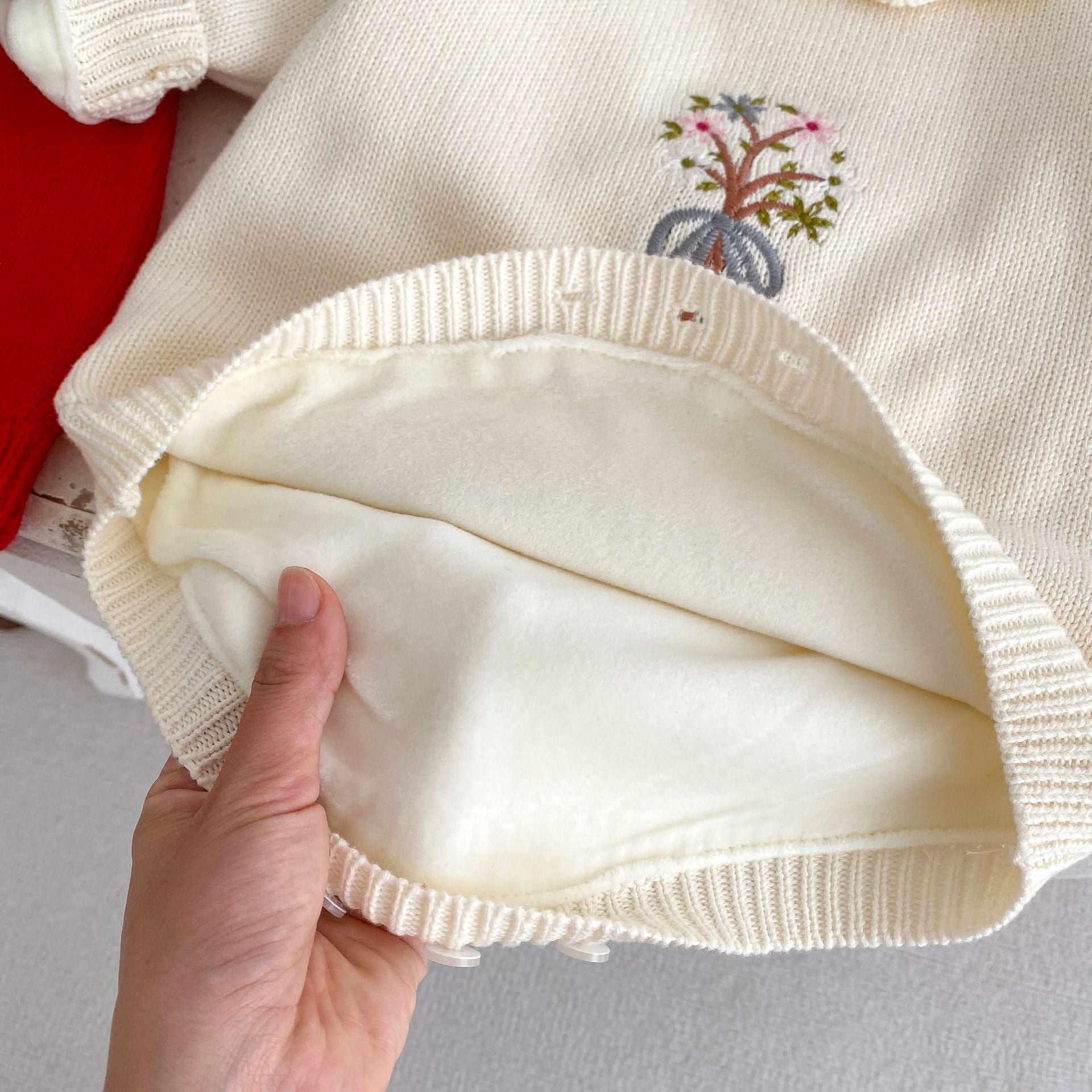 Long Sleeve 100% Cotton Velvet-In Knitwear Romper for baby girl in red and beige colors, featuring embroidered design.