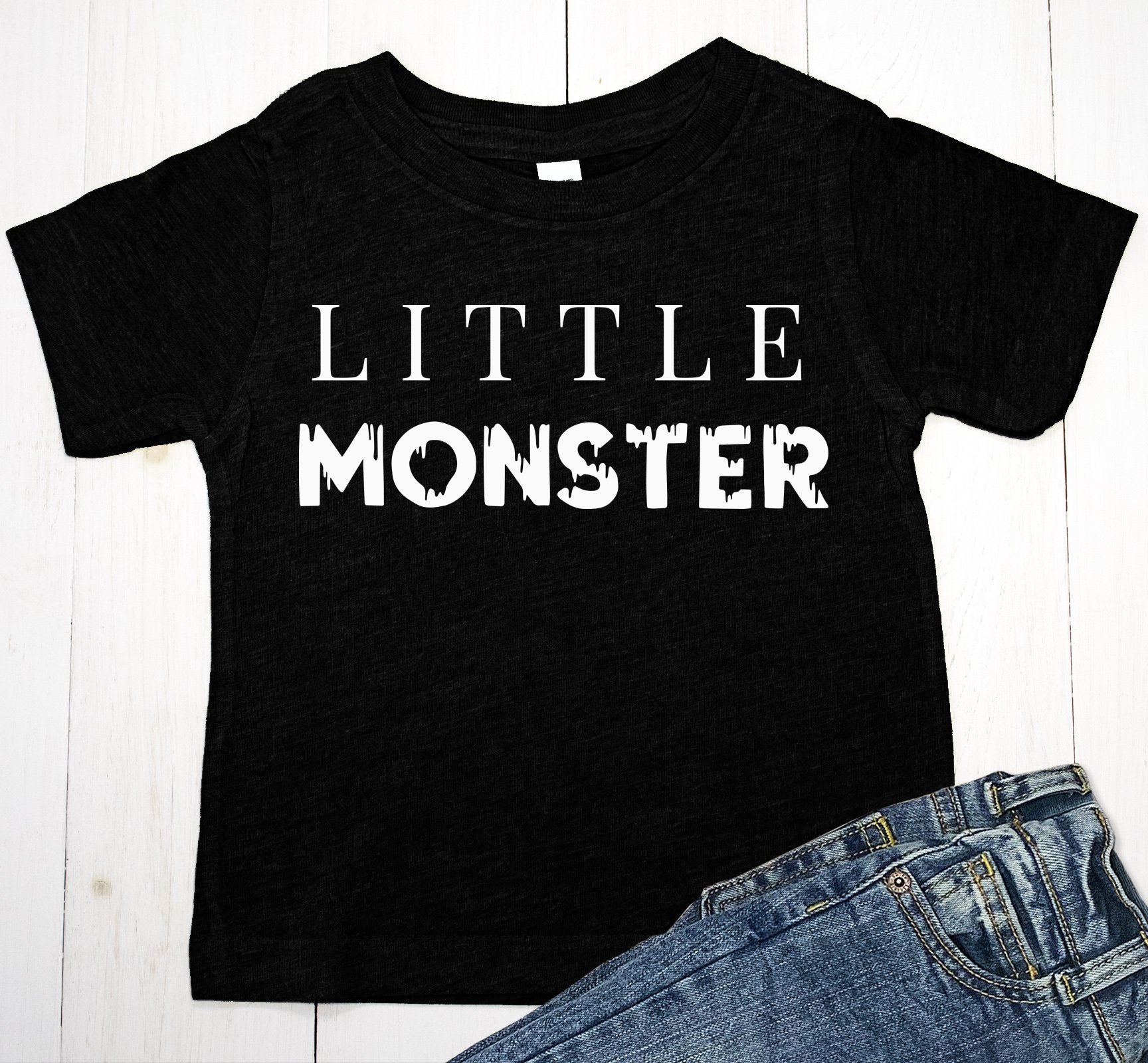 Little Monster Halloween shirt for baby boys and toddlers in olive and black colors, featuring a playful design.