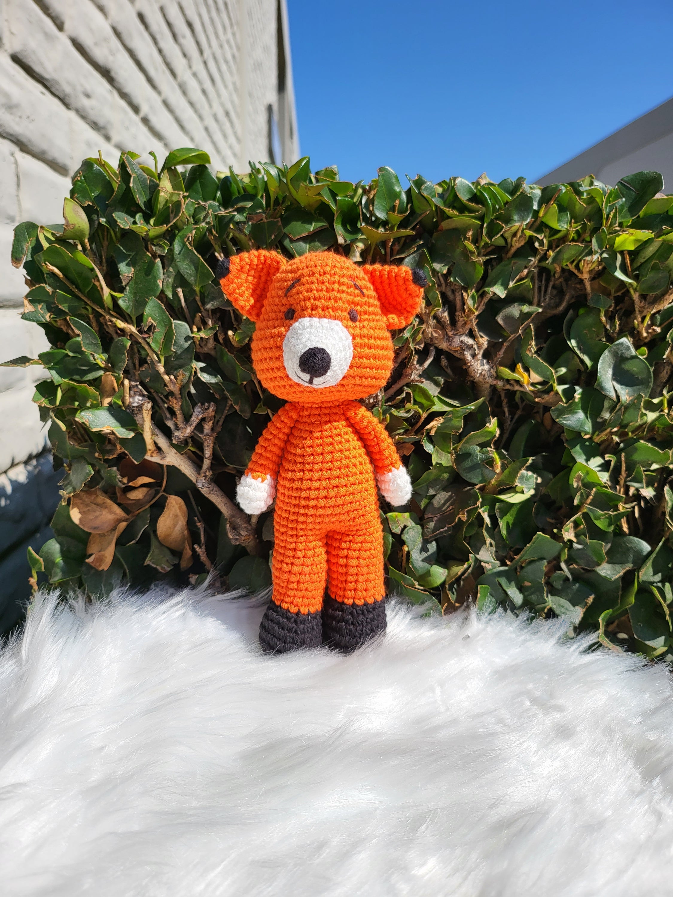 A charming Mini Standing Fox V1 crochet toy, handcrafted from 100% cotton yarn, featuring a unique design with soft textures and vibrant colors.