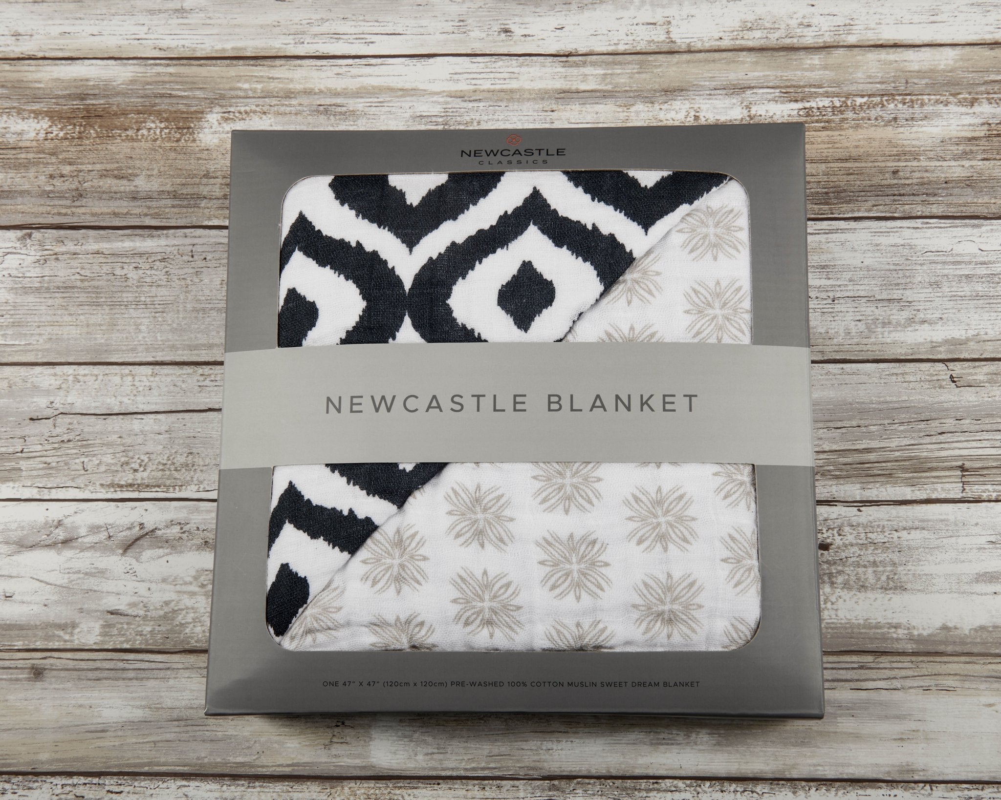 Morrocan Blue and Flower Child Cotton Muslin Newcastle Blanket, showcasing a beautiful floral pattern in soft cotton fabric.