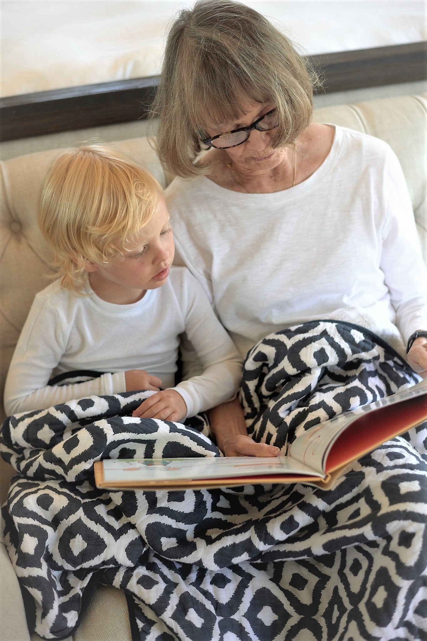 Morrocan Blue and Flower Child Cotton Muslin Newcastle Blanket, showcasing a beautiful floral pattern in soft cotton fabric.