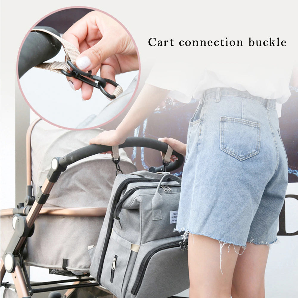 Multi-Use Diaper Bag in gray with expanded toy mode, showcasing its versatility and spacious design for parents on the go.