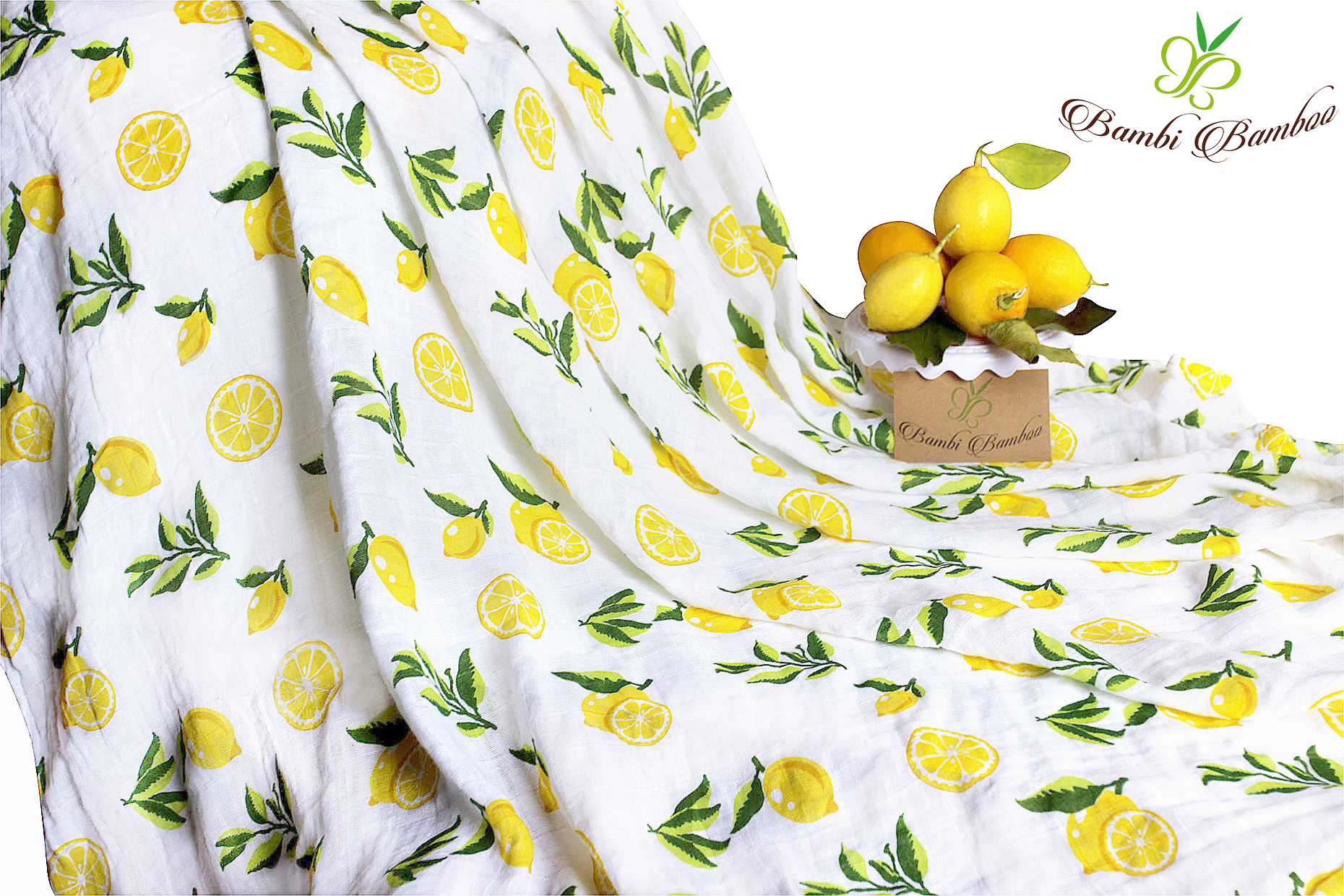 Muslin Swaddle Blanket Set featuring lemon and strawberry prints, showcasing soft and breathable fabric ideal for newborns.