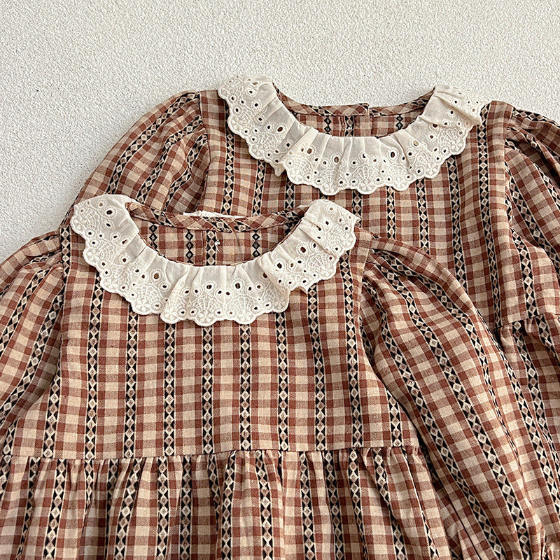 A vintage plaid onesie and dress set for baby girls in brown and coffee colors, showcasing a stylish design perfect for spring and autumn.
