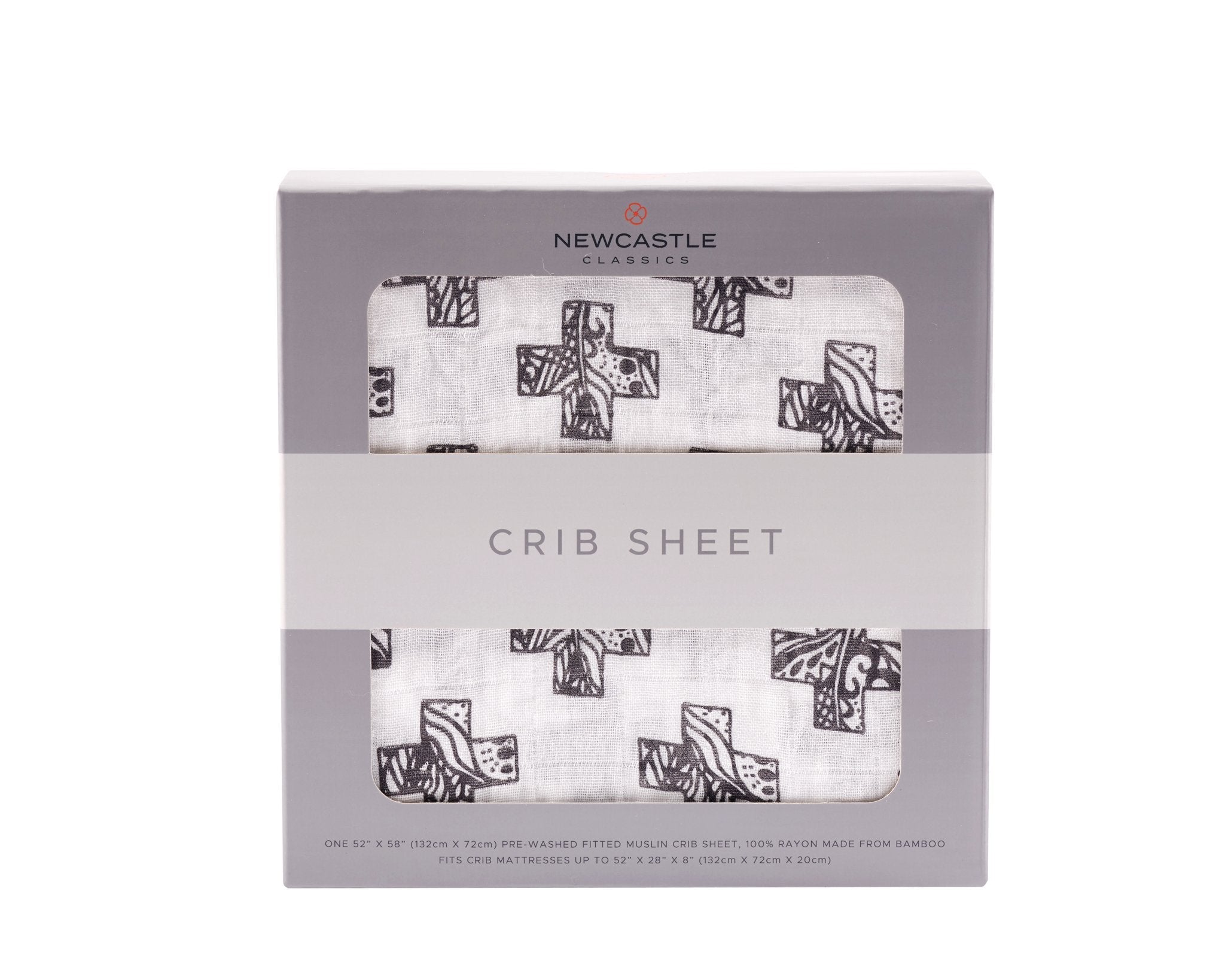 Nordic Stamp Bamboo Muslin Crib Sheet in a crib, showcasing its soft texture and stylish design.
