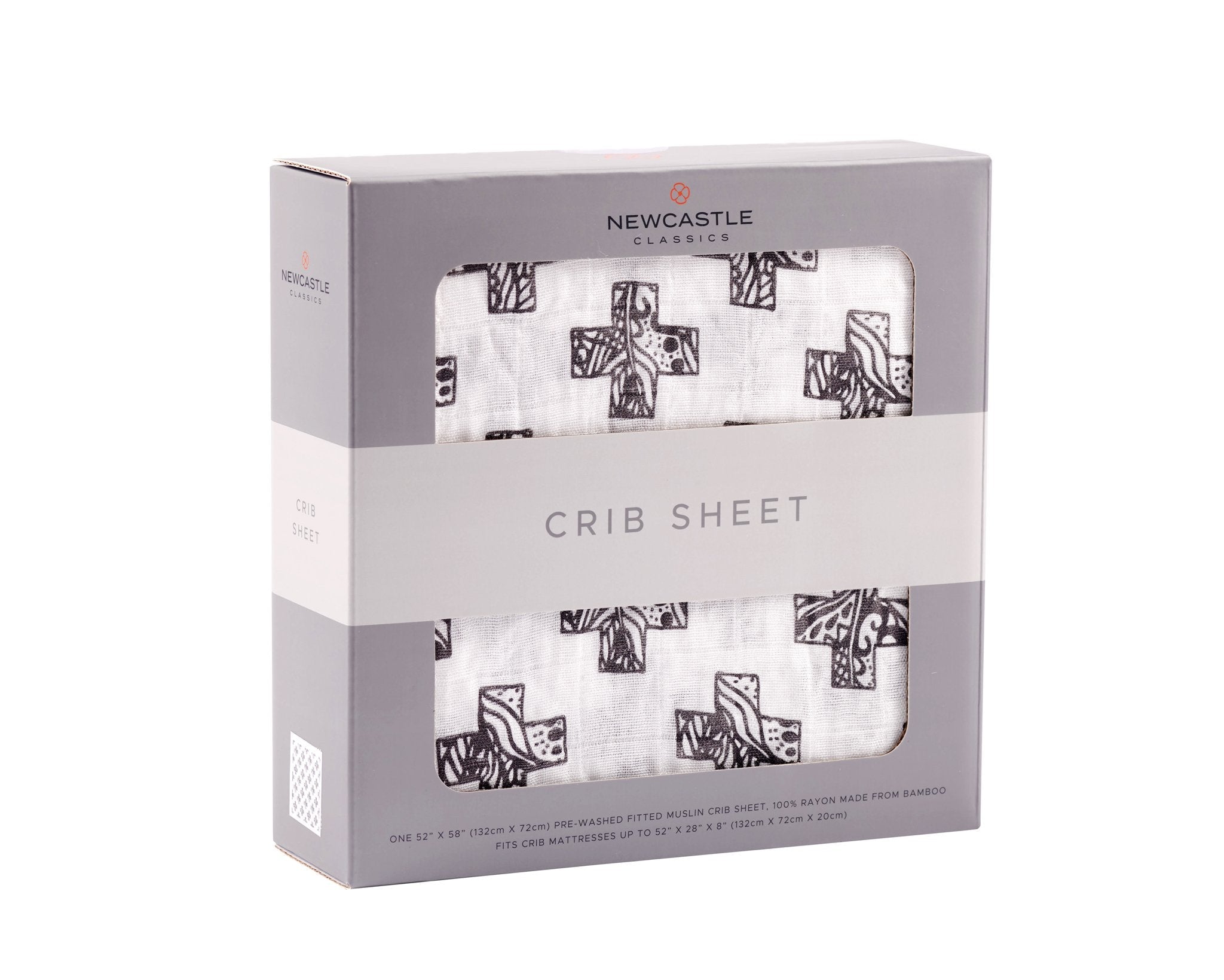 Nordic Stamp Bamboo Muslin Crib Sheet in a crib, showcasing its soft texture and stylish design.