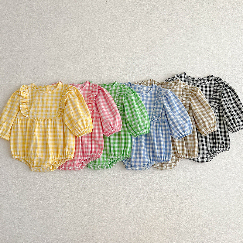 A collection of plaid pattern onesies for baby girls in various colors including black, pink, blue, green, yellow, and brown, made from soft cotton.