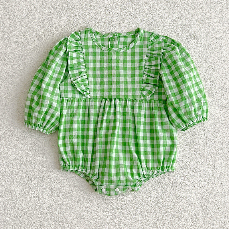 A collection of plaid pattern onesies for baby girls in various colors including black, pink, blue, green, yellow, and brown, made from soft cotton.