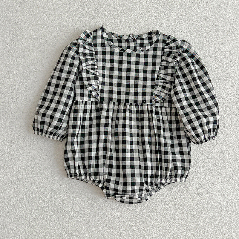 A collection of plaid pattern onesies for baby girls in various colors including black, pink, blue, green, yellow, and brown, made from soft cotton.