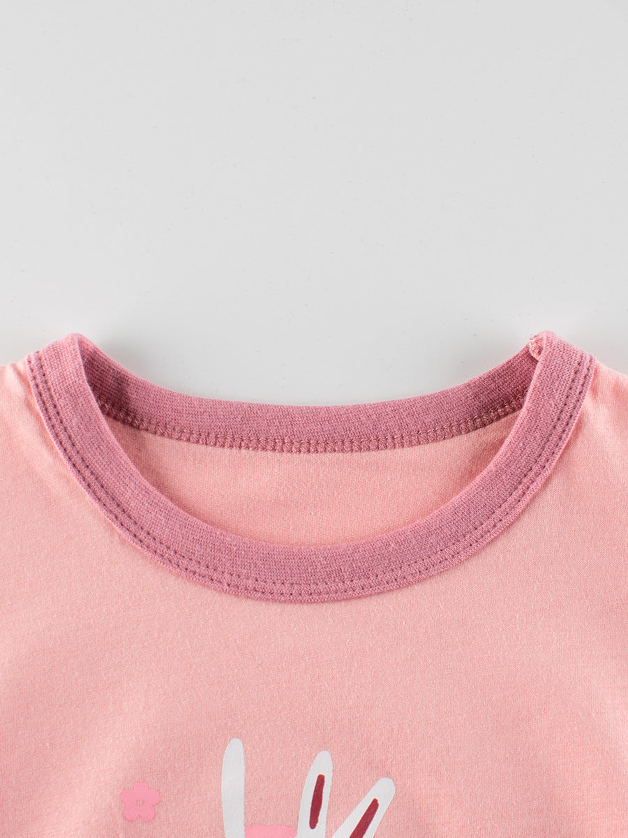 A pink girls' t-shirt featuring a cute rabbit dancer print, made from soft cotton, perfect for summer wear.