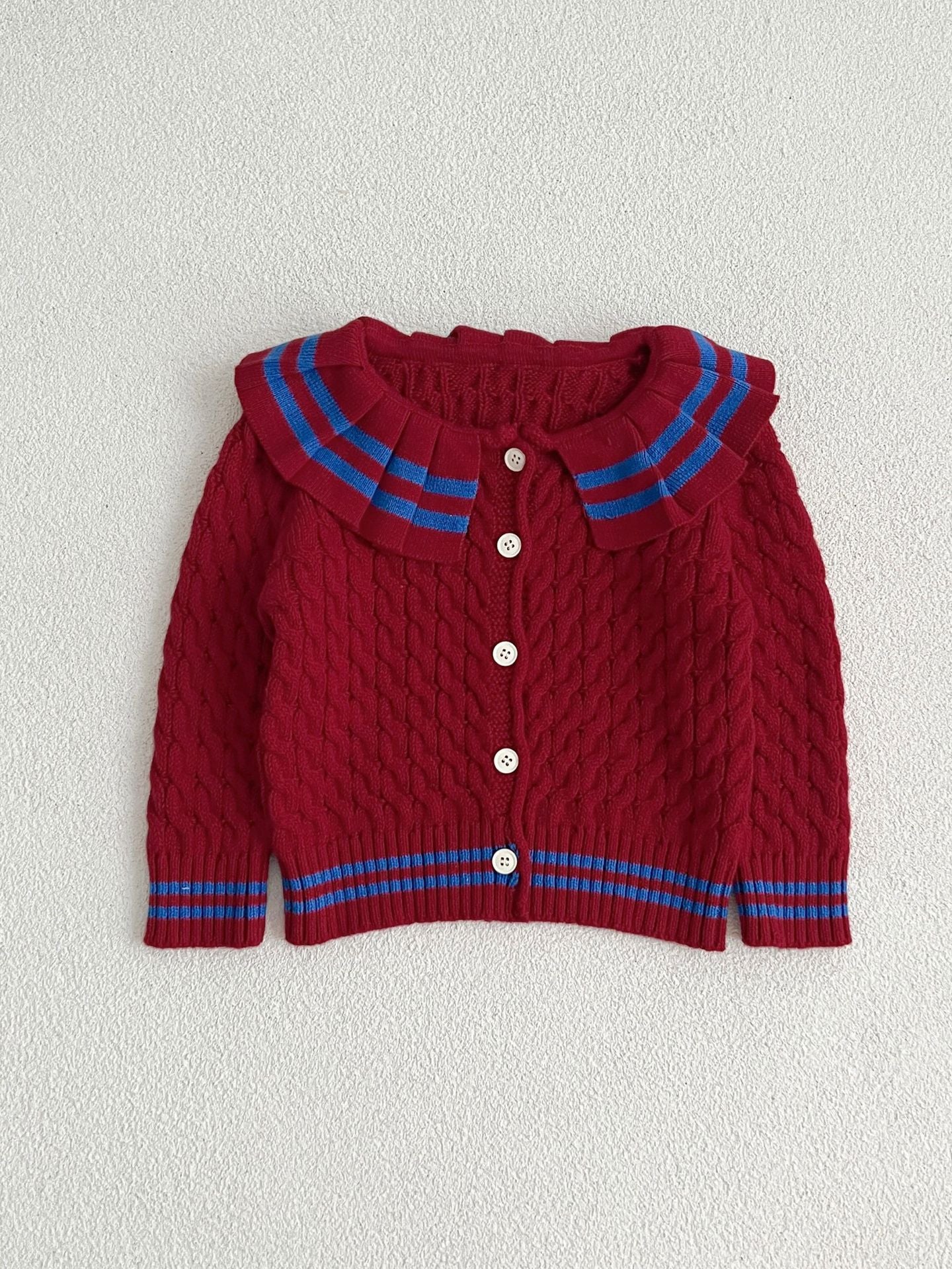 A stylish Sailor Style Striped Pattern Single Breasted Cardigan in white and red, made of soft cotton, suitable for baby girls and boys.