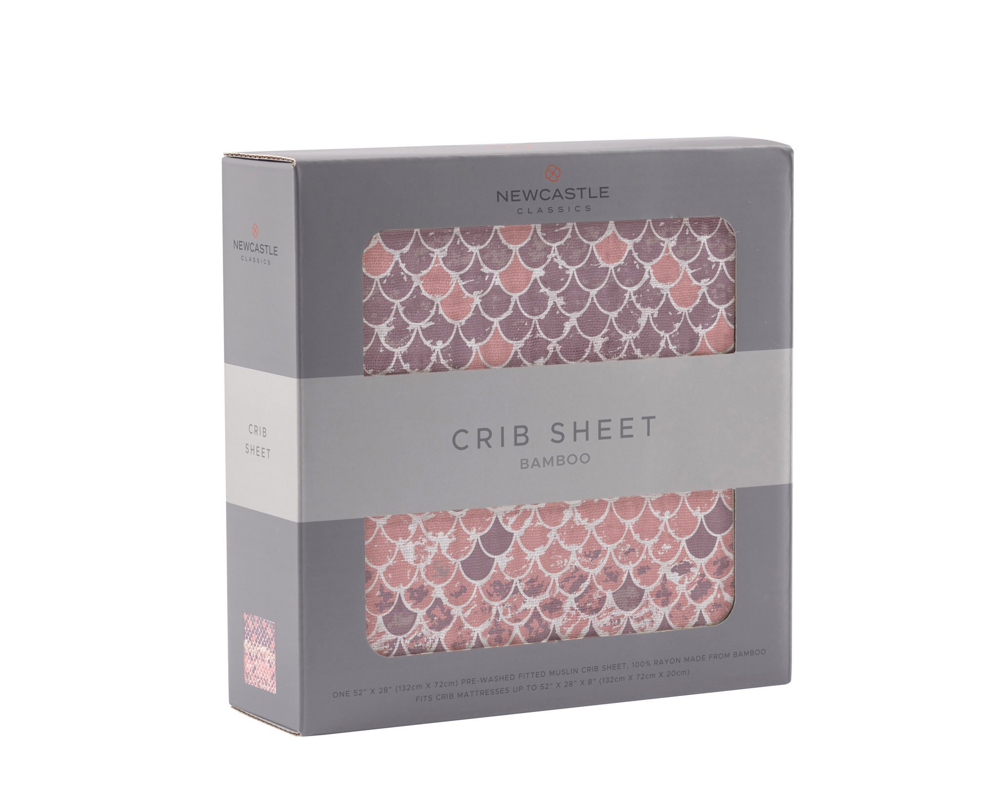 Scales Bamboo Muslin Crib Sheet in a nursery setting, showcasing its soft texture and stylish design.