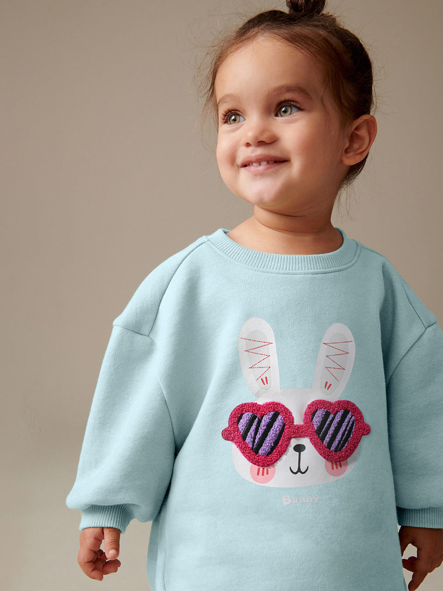 A cute blue long sleeves top for girls featuring a cartoon rabbit pattern, perfect for spring and autumn wear.