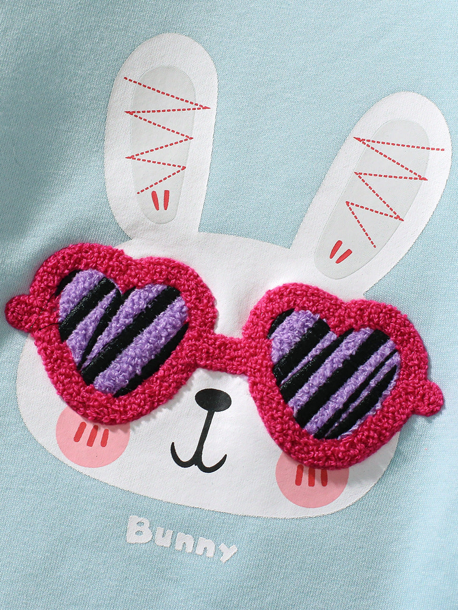 A cute blue long sleeves top for girls featuring a cartoon rabbit pattern, perfect for spring and autumn wear.