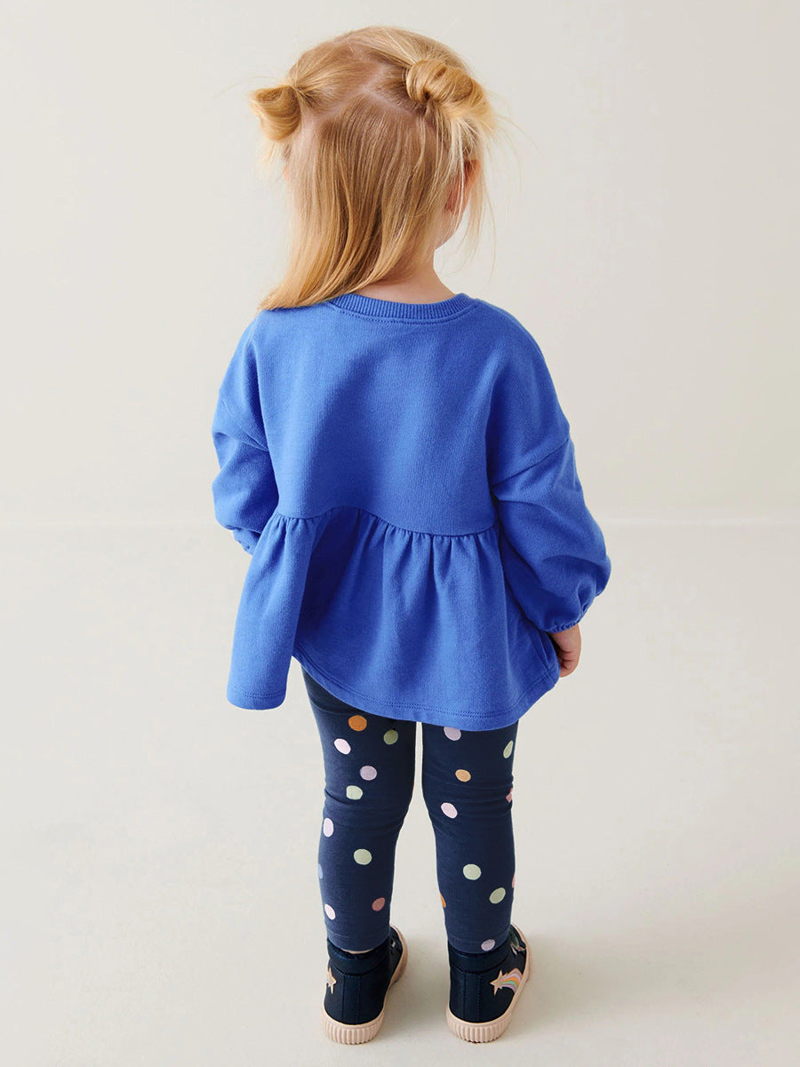 A blue long-sleeve top for girls featuring a cute rainbow embroidery pattern, perfect for spring and autumn wear.