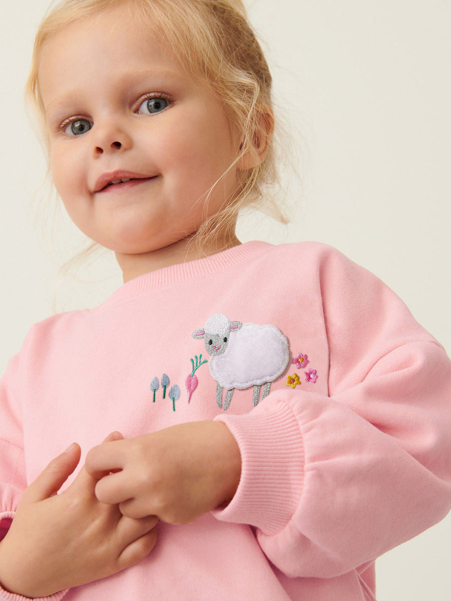 A pink long sleeves top for girls featuring a cute sheep cartoon pattern, made from cotton and polyester, perfect for spring and autumn.