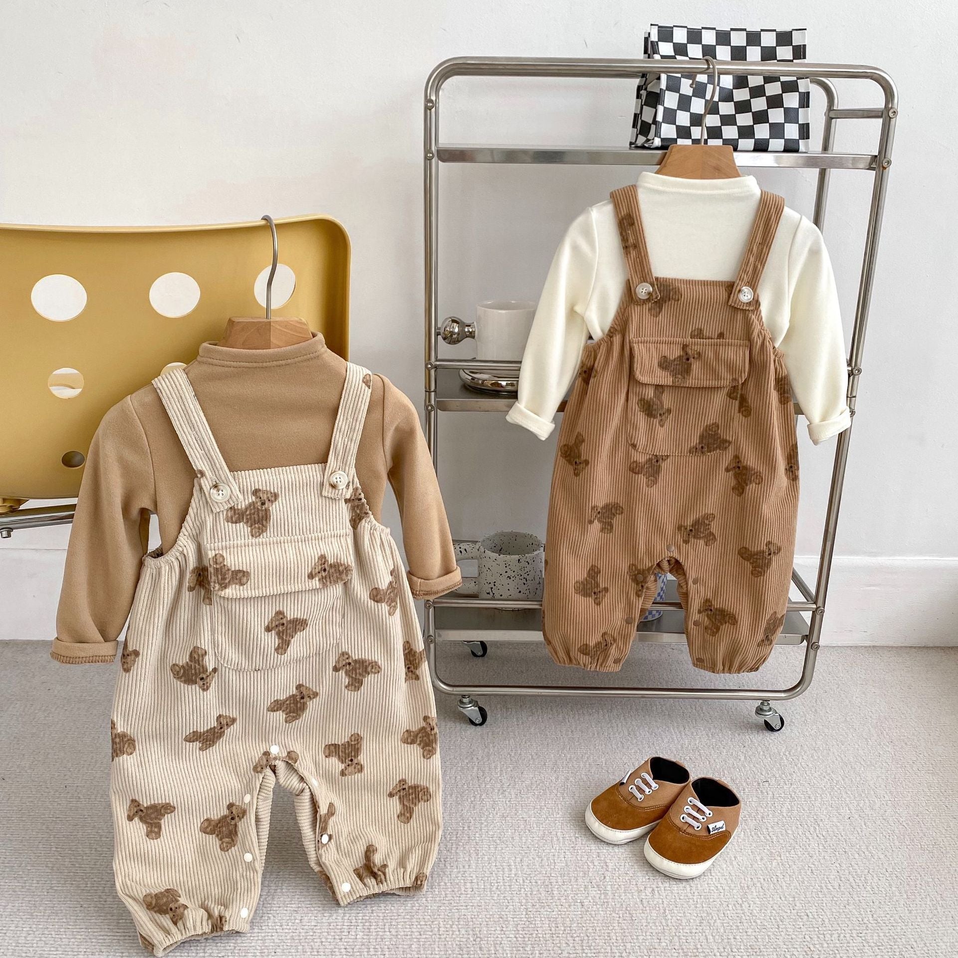 Adorable unisex baby corduroy overalls in khaki and brown with a cute teddy cartoon pattern, perfect for spring and autumn.