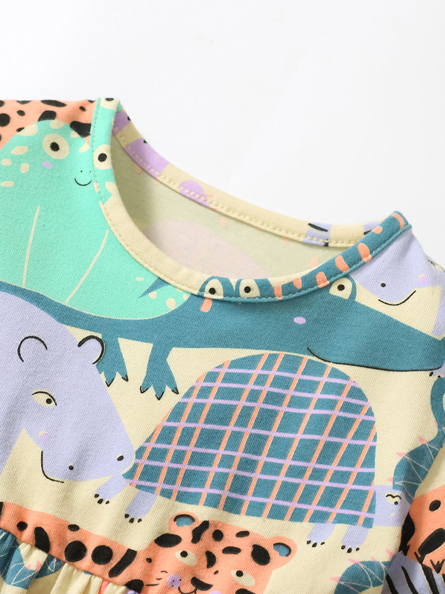 A cute apricot dress for baby girls featuring playful animal and cartoon patterns, perfect for spring and summer wear.