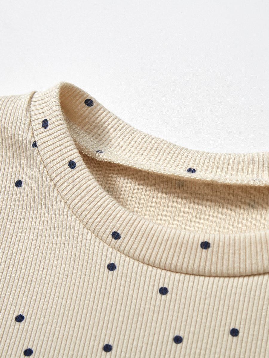 A cute black short-sleeved top for baby girls featuring a panda cartoon design and polka dots, perfect for spring and summer wear.