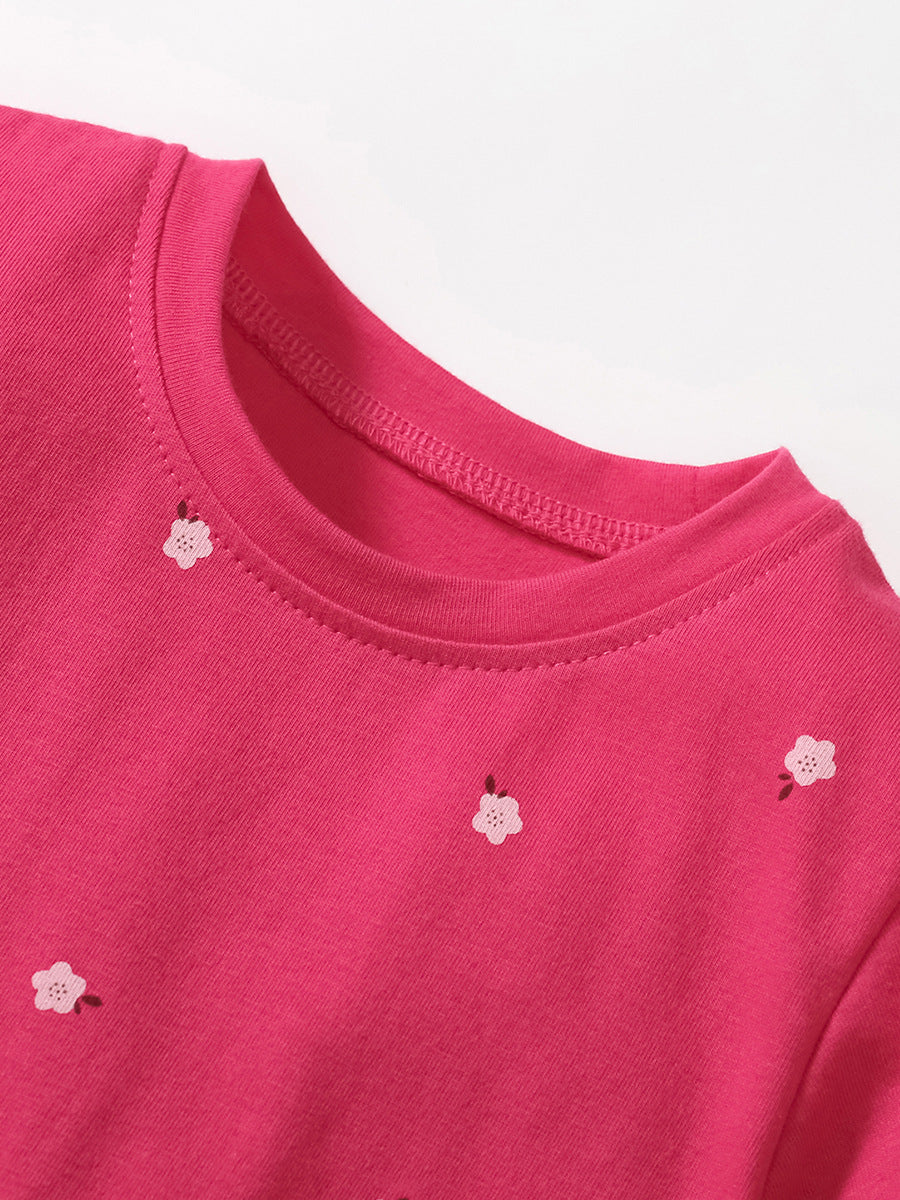 A vibrant pink short-sleeve top for baby girls featuring a rainbow horse and floral design, perfect for spring and summer wear.