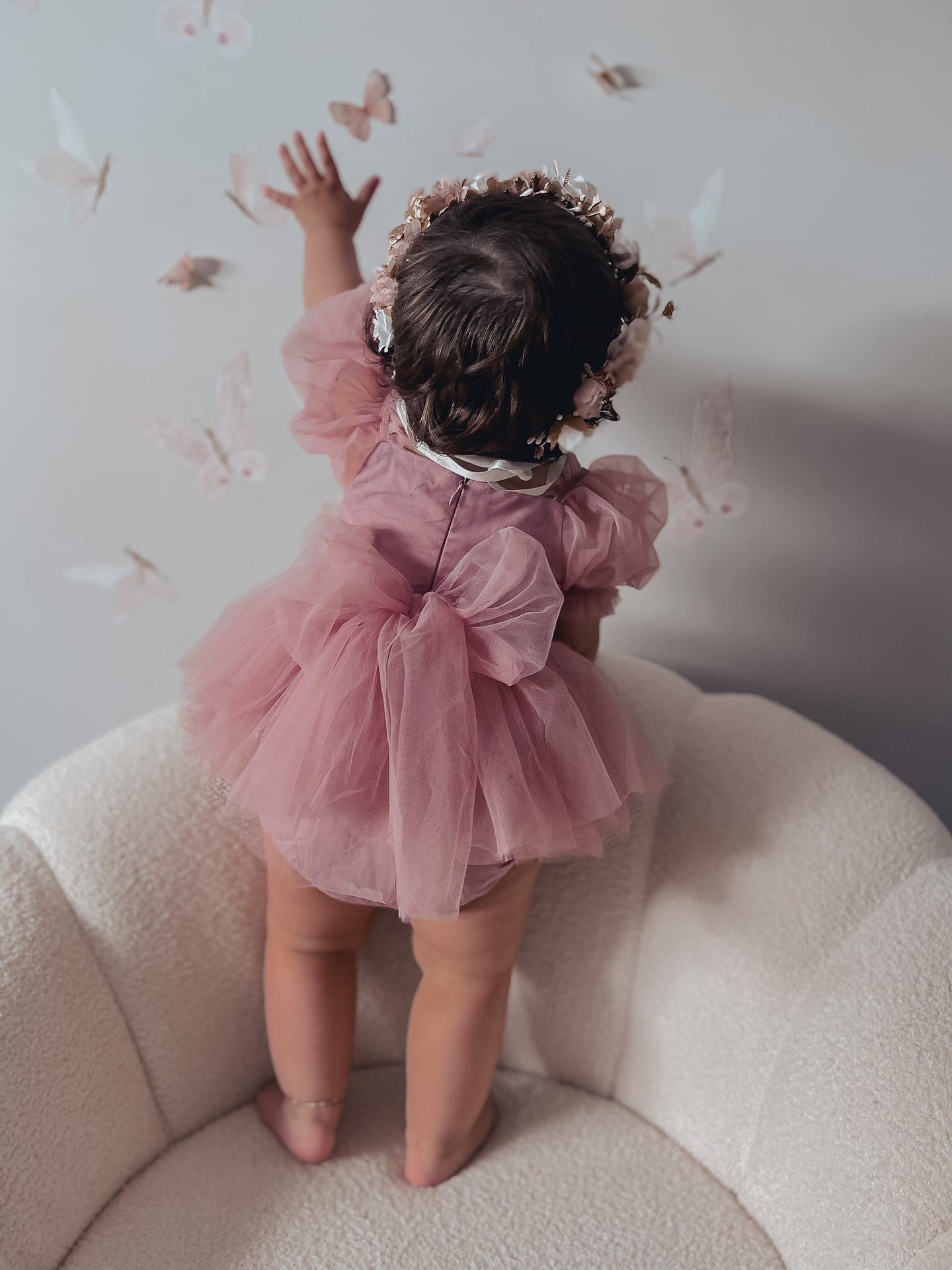 A cute Spring and Summer Baby Girls Short Sleeves Solid Color Mesh Dress in white and pink, perfect for warm weather.