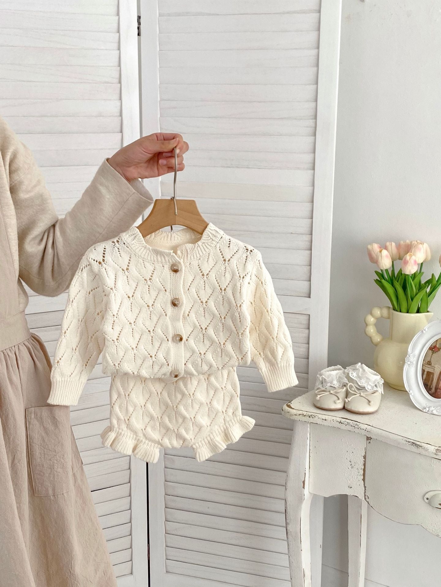 Beige hollow out knitting pattern cardigan sweater for baby girls, made of soft cotton, perfect for spring and summer wear.