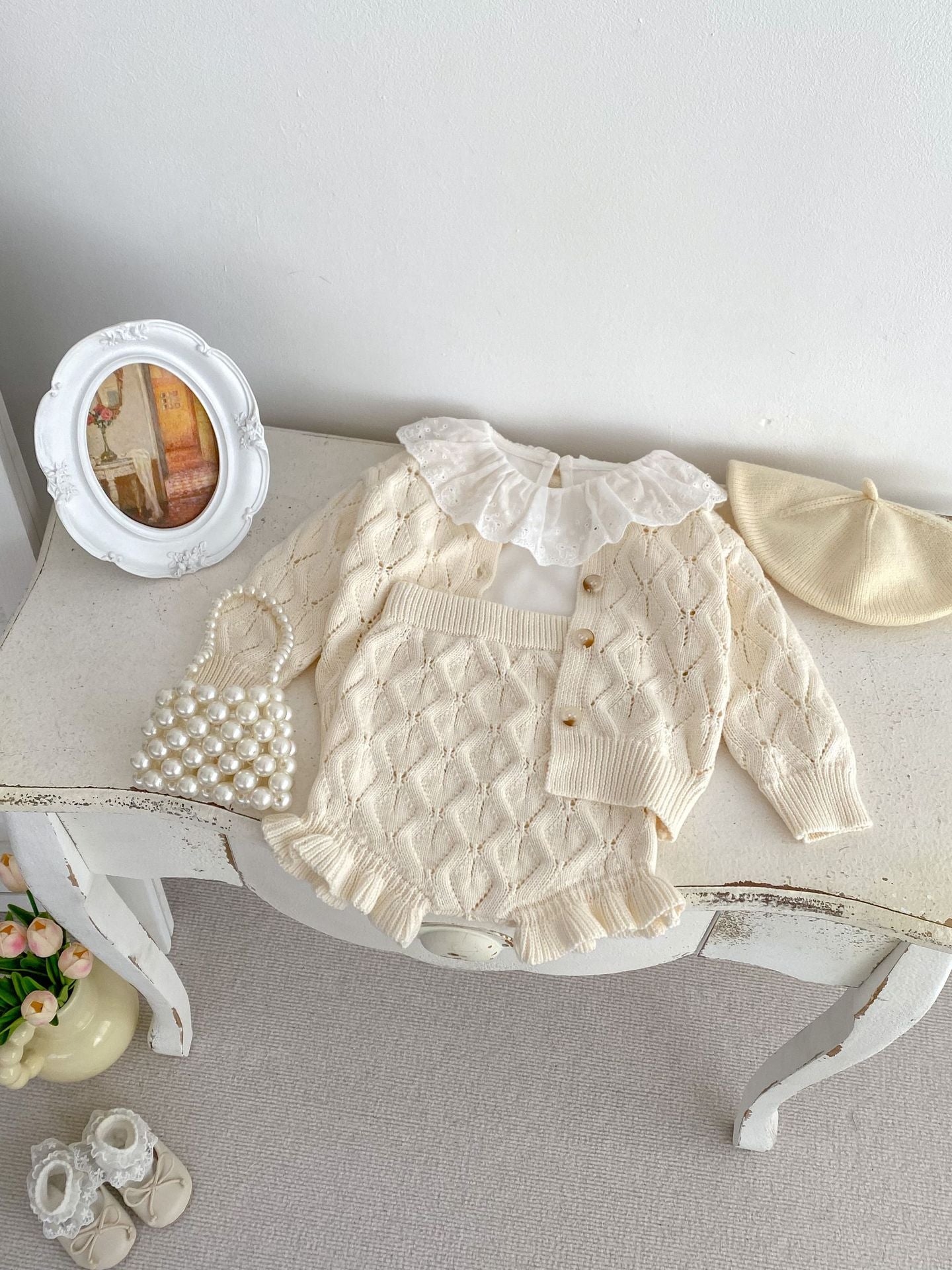 Beige hollow out knitting pattern cardigan sweater for baby girls, made of soft cotton, perfect for spring and summer wear.