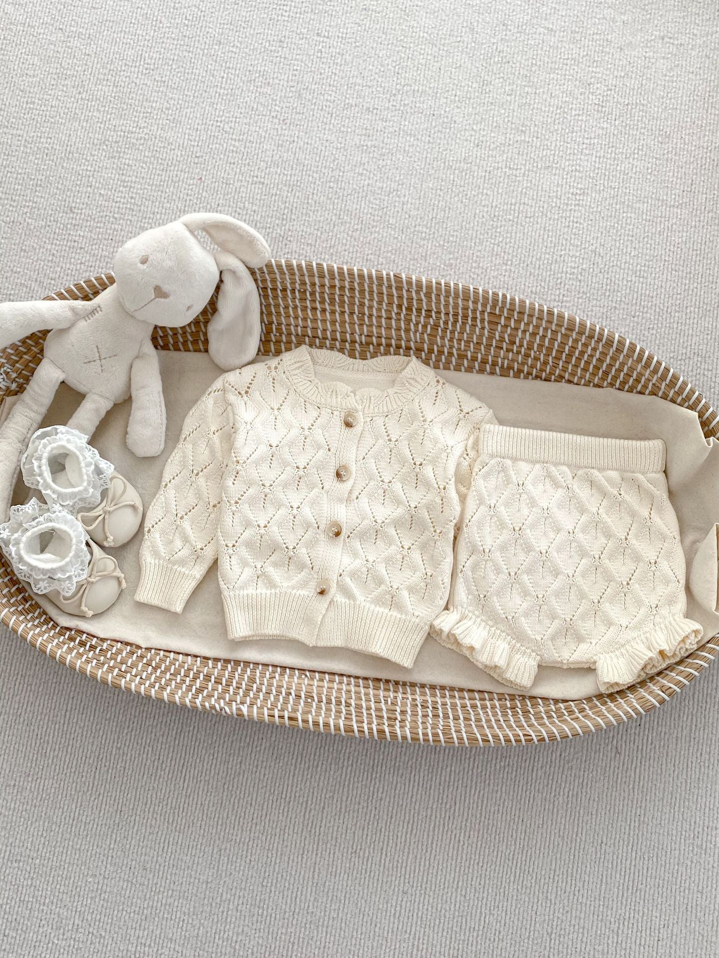 Beige hollow out knitting pattern cardigan sweater for baby girls, made of soft cotton, perfect for spring and summer wear.