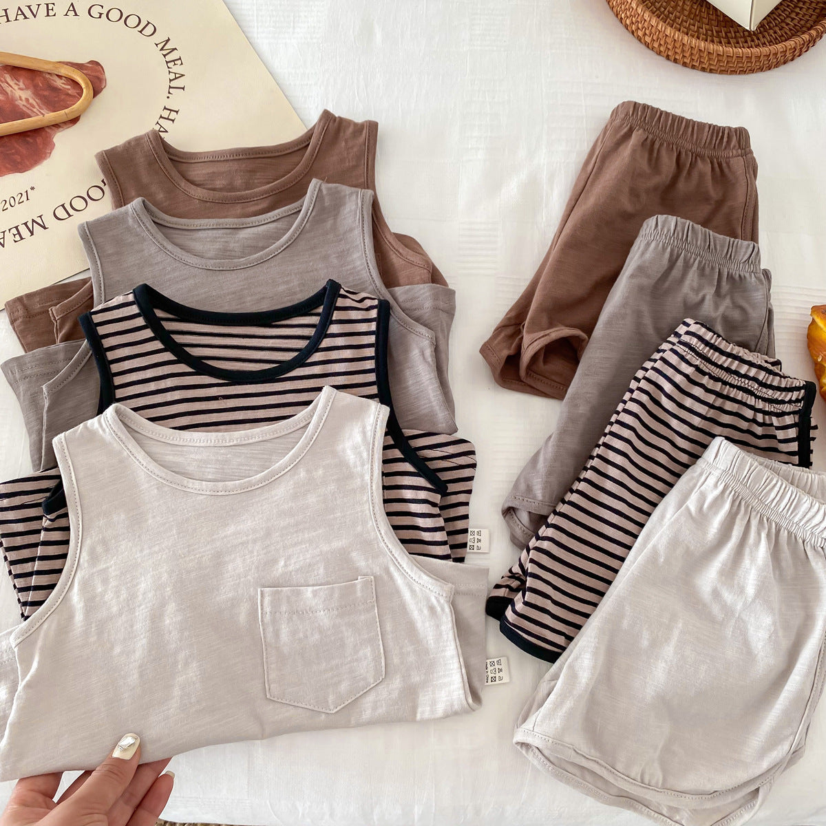 Spring Baby Kids Unisex Top Sleeveless Vest and Shorts Clothing Set in Grey, Khaki, Beige, and Coffee colors, suitable for boys and girls.