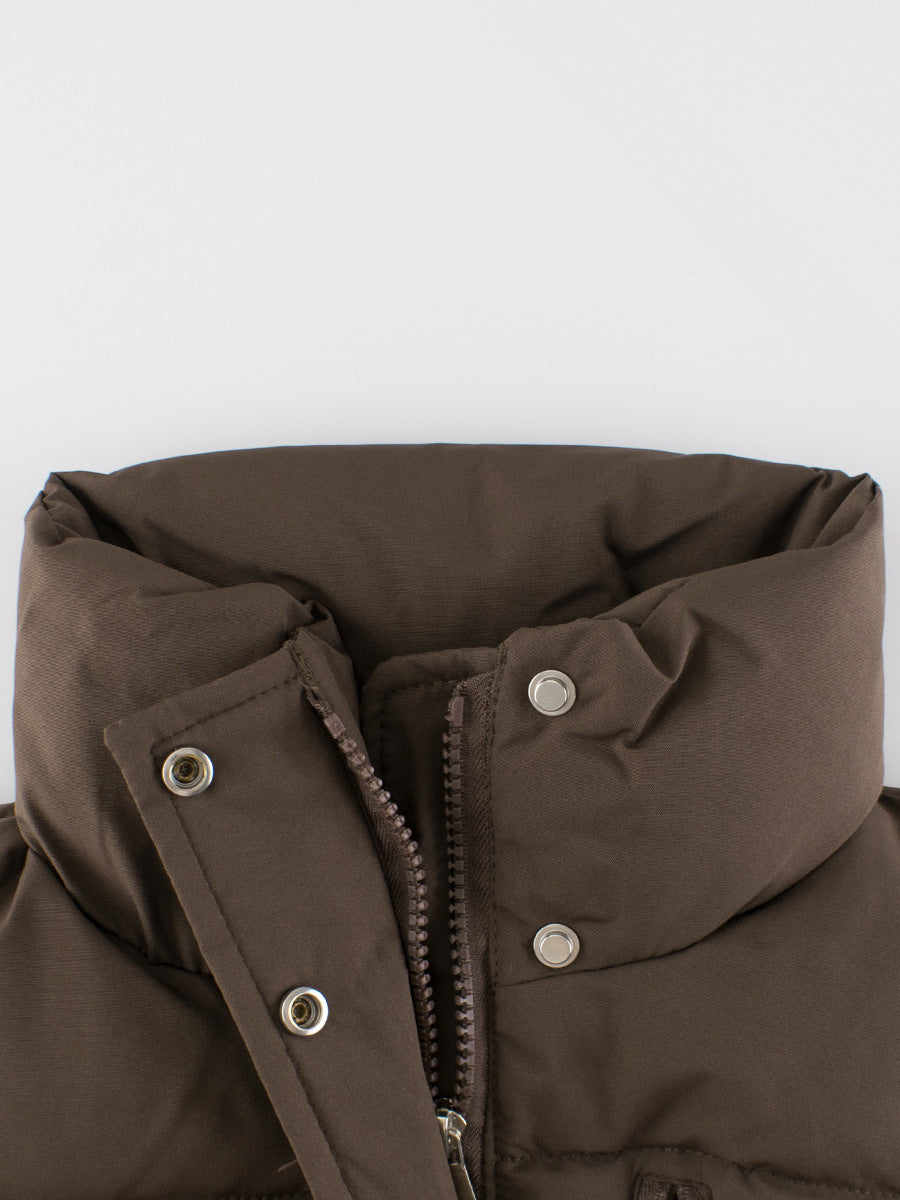 Stylish sleeveless single-breasted coat for kids in black, beige, and coffee colors, suitable for both boys and girls.