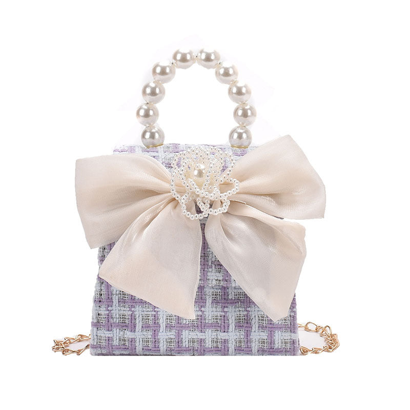 Stylish Carry-On Girls’ Portable Beaded Crossbody Handbag with Bow in vibrant colors and plaid pattern, perfect for young girls.