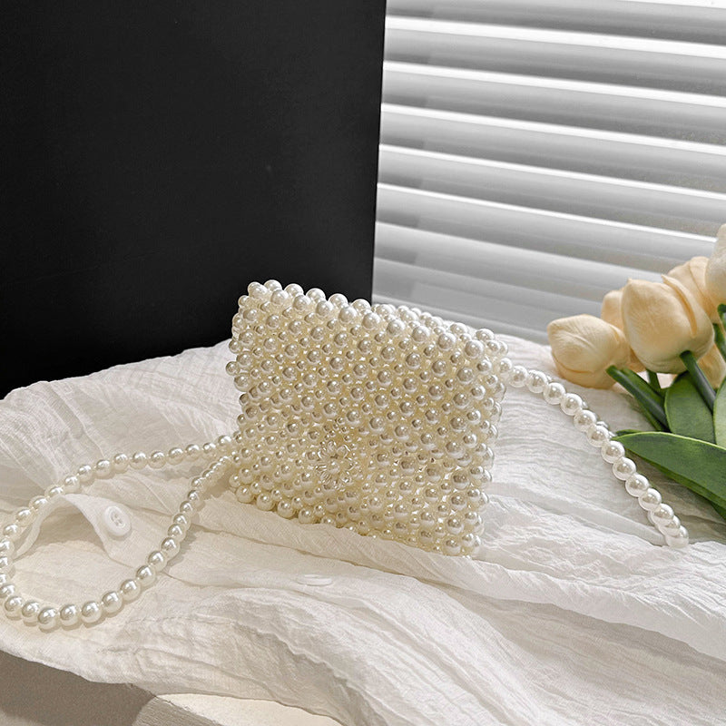 Stylish Cute Carry-On Girls’ Portable Beaded Beige Princess Crossbody bag featuring a charming beaded design in beige color.